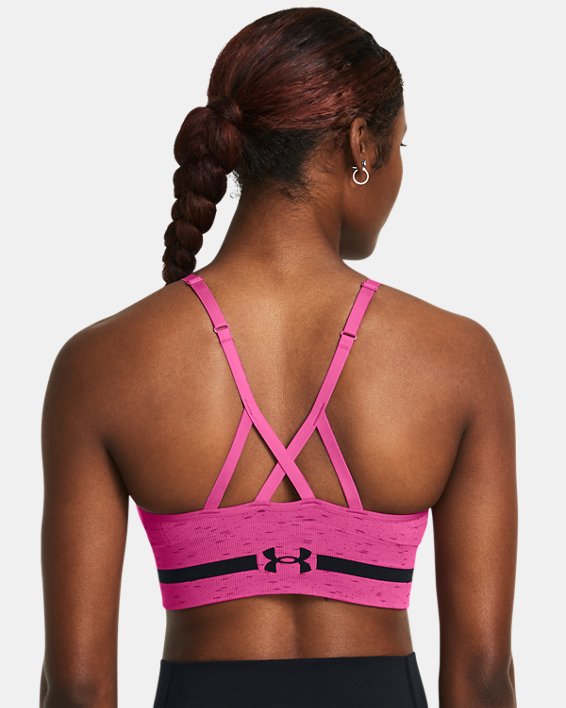 Women's UA Seamless Low Long Heather Sports Bra in Pink image number 1